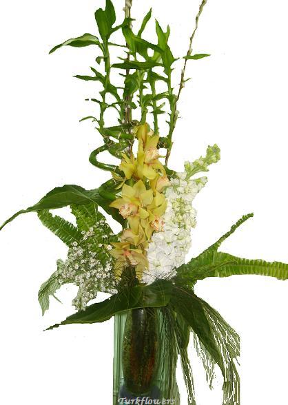 Bambu ve orkide den olu�an arajman<br>3 Adet spiral bambu , 1 dal orkide , �ebboy ve yapraklardan olu�an cam vazo aranjman . ortalama �r�n boyutlar� 50x65 cm